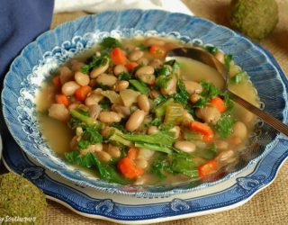 a plate of creole pinto beans and greens soup