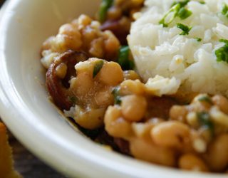 a close up of south louisiana style white beans and rice
