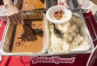 4 serving pans of red beans and rice