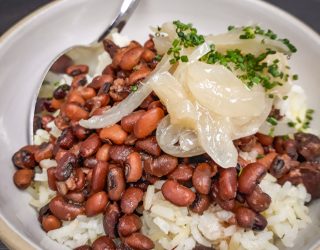 bowl of Chef Jenn's Smoky Field Peas with Brown Butter Onions and Rice