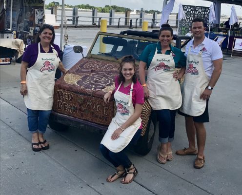 Cameilla bean car with 4 Cameillia brand team members