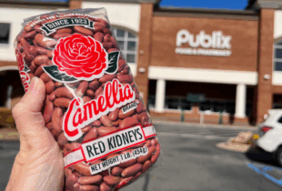 red kidney bean bag in front of publix store